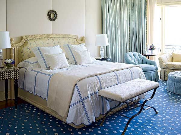 blue floored bedroom